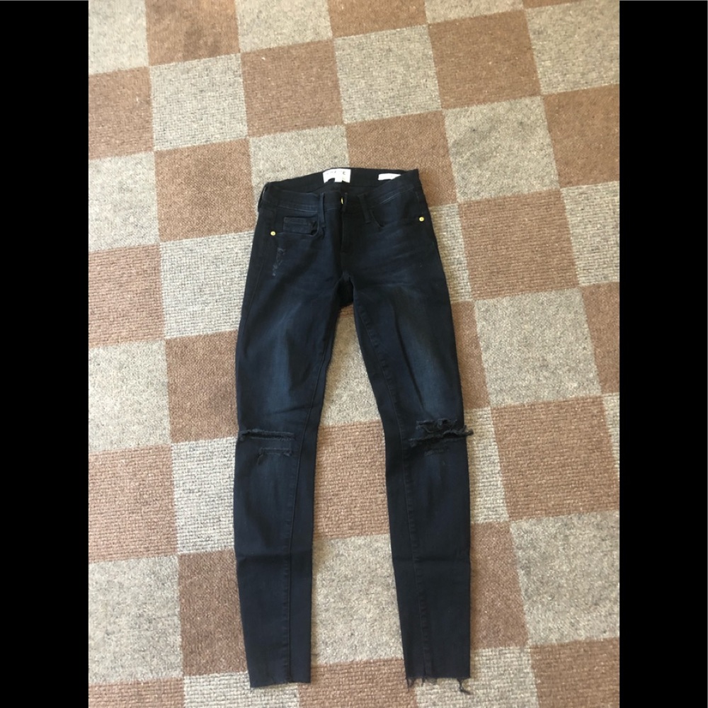 frame, navy ripped jeans , size 25, worn once!